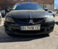 Чорний Міцубісі Lancer, об'ємом двигуна 1.58 л та пробігом 222 тис. км за 3500 $, фото 1 на Automoto.ua