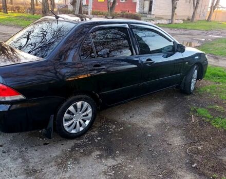 Чорний Міцубісі Lancer, об'ємом двигуна 1.6 л та пробігом 260 тис. км за 3900 $, фото 2 на Automoto.ua