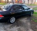 Чорний Міцубісі Lancer, об'ємом двигуна 1.6 л та пробігом 260 тис. км за 3900 $, фото 2 на Automoto.ua