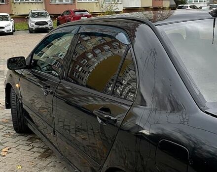 Черный Мицубиси Лансер, объемом двигателя 1.6 л и пробегом 200 тыс. км за 3000 $, фото 3 на Automoto.ua