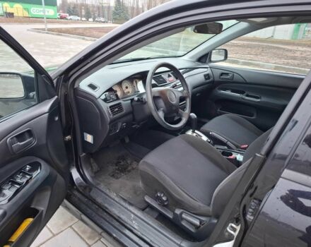 Чорний Міцубісі Lancer, об'ємом двигуна 1.6 л та пробігом 180 тис. км за 5100 $, фото 9 на Automoto.ua