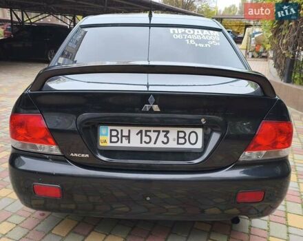 Мицубиси Лансер 2005 в Одессе на Automoto.ua Черный Мицубиси Лансер, объемом двигателя 1.58 л и пробегом 206 тыс. км за 3900 $, фото 4 на Automoto.ua