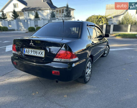 Мицубиси Лансер 2005 в Виннице на Automoto.ua Черный Мицубиси Лансер, объемом двигателя 1.6 л и пробегом 261 тыс. км за 4100 $, фото 10 на Automoto.ua