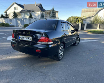 Мицубиси Лансер 2005 в Виннице на Automoto.ua Черный Мицубиси Лансер, объемом двигателя 1.6 л и пробегом 261 тыс. км за 4100 $, фото 8 на Automoto.ua