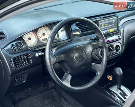 Мицубиси Лансер 2005 в Черкассах на Automoto.ua Черный Мицубиси Лансер, объемом двигателя 1.58 л и пробегом 368 тыс. км за 4400 $, фото 24 на Automoto.ua