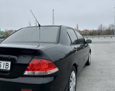 Черный Мицубиси Лансер, объемом двигателя 1.6 л и пробегом 200 тыс. км за 3499 $, фото 2 на Automoto.ua