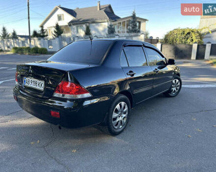 Мицубиси Лансер 2005 в Виннице на Automoto.ua Черный Мицубиси Лансер, объемом двигателя 1.6 л и пробегом 261 тыс. км за 4100 $, фото 12 на Automoto.ua