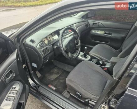 Черный Мицубиси Лансер, объемом двигателя 1.58 л и пробегом 280 тыс. км за 3200 $, фото 10 на Automoto.ua