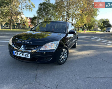 Мицубиси Лансер 2005 в Виннице на Automoto.ua Черный Мицубиси Лансер, объемом двигателя 1.6 л и пробегом 261 тыс. км за 4100 $, фото 6 на Automoto.ua