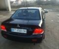 Чорний Міцубісі Lancer, об'ємом двигуна 1.6 л та пробігом 275 тис. км за 2999 $, фото 15 на Automoto.ua