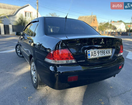 Мицубиси Лансер 2005 в Виннице на Automoto.ua Черный Мицубиси Лансер, объемом двигателя 1.6 л и пробегом 261 тыс. км за 4100 $, фото 25 на Automoto.ua