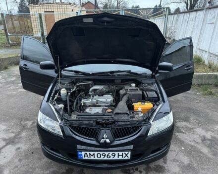 Чорний Міцубісі Lancer, об'ємом двигуна 1.6 л та пробігом 154 тис. км за 5500 $, фото 16 на Automoto.ua