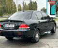 Чорний Міцубісі Lancer, об'ємом двигуна 1.58 л та пробігом 390 тис. км за 4500 $, фото 6 на Automoto.ua