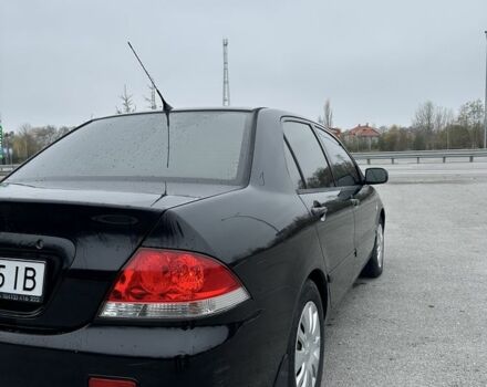 Черный Мицубиси Лансер, объемом двигателя 1.6 л и пробегом 200 тыс. км за 3500 $, фото 5 на Automoto.ua