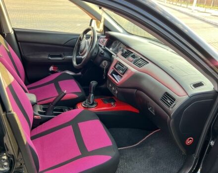 Чорний Міцубісі Lancer, об'ємом двигуна 2 л та пробігом 261 тис. км за 2700 $, фото 8 на Automoto.ua