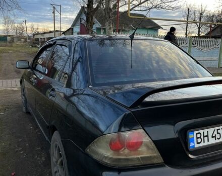 Чорний Міцубісі Lancer, об'ємом двигуна 2 л та пробігом 485 тис. км за 4500 $, фото 7 на Automoto.ua