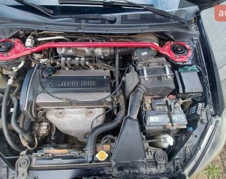 Черный Мицубиси Лансер, объемом двигателя 2 л и пробегом 225 тыс. км за 4400 $, фото 16 на Automoto.ua