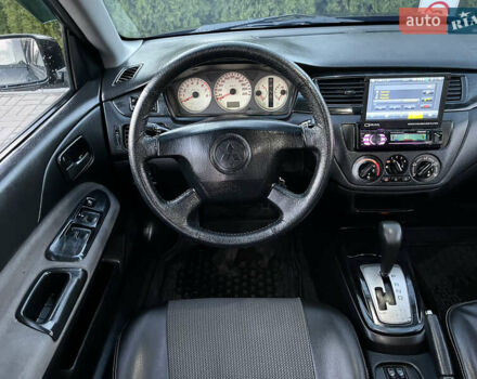Мицубиси Лансер 2005 в Черкассах на Automoto.ua Черный Мицубиси Лансер, объемом двигателя 1.58 л и пробегом 368 тыс. км за 4400 $, фото 30 на Automoto.ua