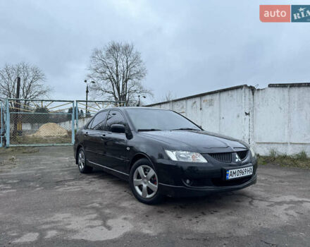 Черный Мицубиси Лансер, объемом двигателя 1.58 л и пробегом 154 тыс. км за 5500 $, фото 1 на Automoto.ua