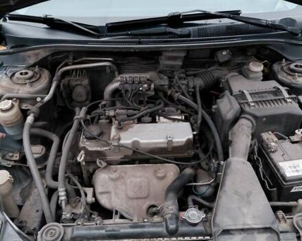 Черный Мицубиси Лансер, объемом двигателя 1.58 л и пробегом 238 тыс. км за 3500 $, фото 3 на Automoto.ua