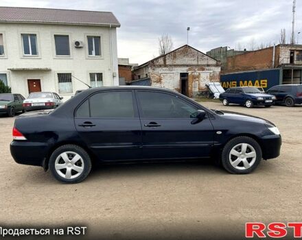 Чорний Міцубісі Lancer, об'ємом двигуна 1.6 л та пробігом 250 тис. км за 3700 $, фото 5 на Automoto.ua
