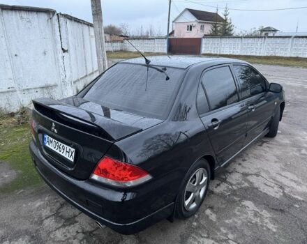 Чорний Міцубісі Lancer, об'ємом двигуна 1.6 л та пробігом 154 тис. км за 5500 $, фото 7 на Automoto.ua
