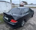 Чорний Міцубісі Lancer, об'ємом двигуна 1.6 л та пробігом 154 тис. км за 5500 $, фото 7 на Automoto.ua