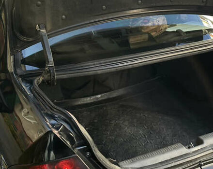 Черный Мицубиси Лансер, объемом двигателя 1.6 л и пробегом 200 тыс. км за 3000 $, фото 8 на Automoto.ua