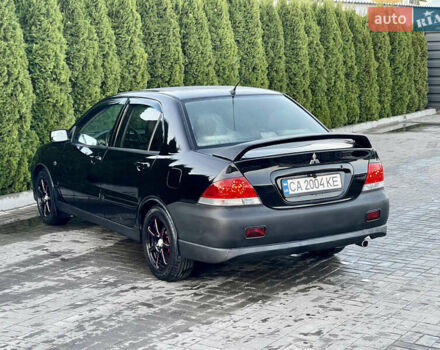 Мицубиси Лансер 2005 в Черкассах на Automoto.ua Черный Мицубиси Лансер, объемом двигателя 1.58 л и пробегом 368 тыс. км за 4400 $, фото 18 на Automoto.ua