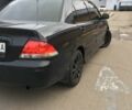 Черный Мицубиси Лансер, объемом двигателя 1.6 л и пробегом 250 тыс. км за 3100 $, фото 5 на Automoto.ua