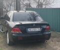 Чорний Міцубісі Lancer, об'ємом двигуна 1.58 л та пробігом 279 тис. км за 4000 $, фото 1 на Automoto.ua