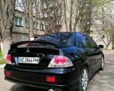 Чорний Міцубісі Lancer, об'ємом двигуна 2 л та пробігом 270 тис. км за 5700 $, фото 7 на Automoto.ua