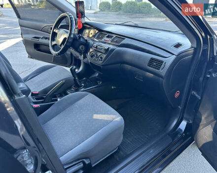 Мицубиси Лансер 2005 в Виннице на Automoto.ua Черный Мицубиси Лансер, объемом двигателя 1.6 л и пробегом 261 тыс. км за 4100 $, фото 51 на Automoto.ua