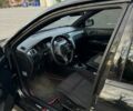 Черный Мицубиси Лансер, объемом двигателя 2 л и пробегом 270 тыс. км за 5200 $, фото 4 на Automoto.ua