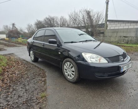 Черный Мицубиси Лансер, объемом двигателя 1.6 л и пробегом 280 тыс. км за 3200 $, фото 5 на Automoto.ua