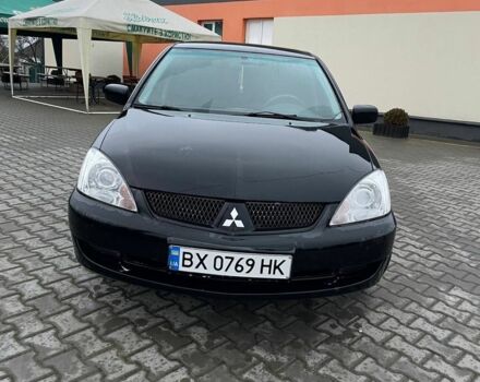 Черный Мицубиси Лансер, объемом двигателя 1.6 л и пробегом 240 тыс. км за 3499 $, фото 5 на Automoto.ua