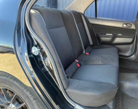 Чорний Міцубісі Lancer, об'ємом двигуна 2 л та пробігом 310 тис. км за 4990 $, фото 10 на Automoto.ua