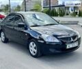 Чорний Міцубісі Lancer, об'ємом двигуна 1.58 л та пробігом 162 тис. км за 4999 $, фото 1 на Automoto.ua