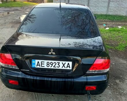 Чорний Міцубісі Lancer, об'ємом двигуна 1.6 л та пробігом 260 тис. км за 3900 $, фото 1 на Automoto.ua