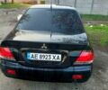 Чорний Міцубісі Lancer, об'ємом двигуна 1.6 л та пробігом 260 тис. км за 3900 $, фото 1 на Automoto.ua