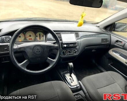 Чорний Міцубісі Lancer, об'ємом двигуна 1.6 л та пробігом 250 тис. км за 3700 $, фото 12 на Automoto.ua
