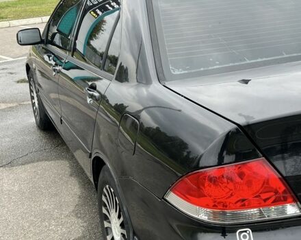 Черный Мицубиси Лансер, объемом двигателя 1.6 л и пробегом 390 тыс. км за 4000 $, фото 6 на Automoto.ua