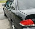 Черный Мицубиси Лансер, объемом двигателя 1.6 л и пробегом 390 тыс. км за 4000 $, фото 6 на Automoto.ua