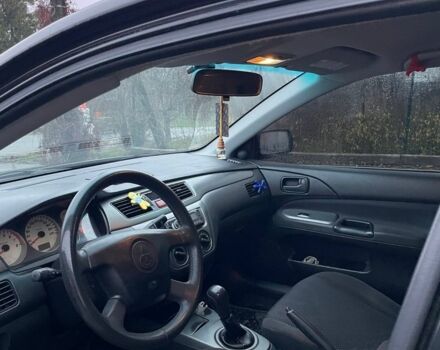 Черный Мицубиси Лансер, объемом двигателя 1.6 л и пробегом 240 тыс. км за 3499 $, фото 6 на Automoto.ua