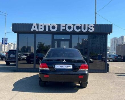 Чорний Міцубісі Lancer, об'ємом двигуна 2 л та пробігом 310 тис. км за 4990 $, фото 6 на Automoto.ua