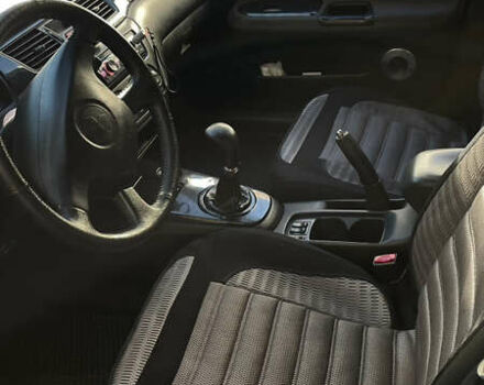 Черный Мицубиси Лансер, объемом двигателя 1.6 л и пробегом 200 тыс. км за 3000 $, фото 11 на Automoto.ua