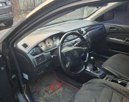 Чорний Міцубісі Lancer, об'ємом двигуна 1.6 л та пробігом 290 тис. км за 3800 $, фото 2 на Automoto.ua