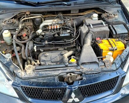 Чорний Міцубісі Lancer, об'ємом двигуна 1.6 л та пробігом 0 тис. км за 4100 $, фото 4 на Automoto.ua