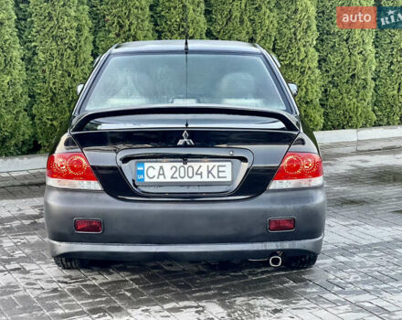 Мицубиси Лансер 2005 в Черкассах на Automoto.ua Черный Мицубиси Лансер, объемом двигателя 1.58 л и пробегом 368 тыс. км за 4400 $, фото 16 на Automoto.ua