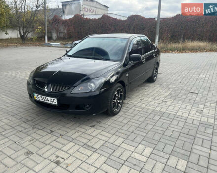 Чорний Міцубісі Lancer, об'ємом двигуна 1.58 л та пробігом 364 тис. км за 4000 $, фото 1 на Automoto.ua